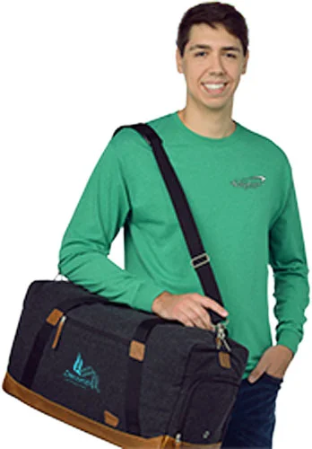 4imprint employee Hunter carrying the Field & Co. Campster Wool 22-inch Duffel Bag